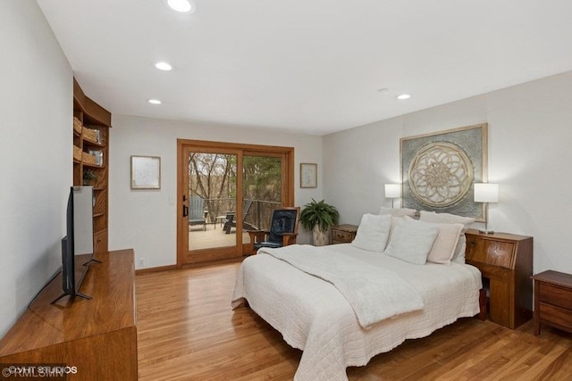 bedroom with light wood-style floors, recessed lighting, and access to outside