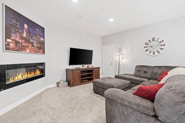 7371 Kalland Cir NE, Otsego, MN 55301 - carpeted living area with a glass covered fireplace, baseboards, and recessed lighting