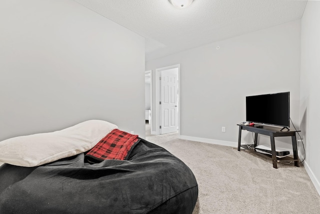 7371 Kalland Cir NE, Otsego, MN 55301 - bedroom with light colored carpet, baseboards, and a textured ceiling