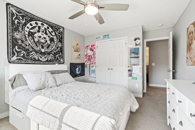 7371 Kalland Cir NE, Otsego, MN 55301 - bedroom with light carpet, baseboards, a closet, and a ceiling fan