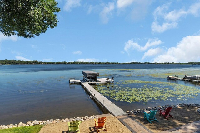 21008 654th Ave, Ellsworth Twp, MN 55355 - dock area featuring a water view
