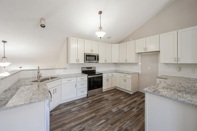 7615 Elm Grove Ave Unit 612, New Hope, MN 55428 - kitchen with lofted ceiling, decorative backsplash, a sink, and appliances with stainless steel finishes