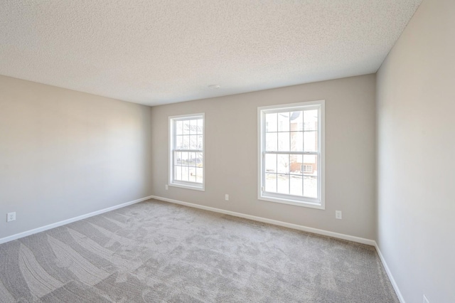 7615 Elm Grove Ave Unit 612, New Hope, MN 55428 - empty room with carpet floors, a textured ceiling, and baseboards