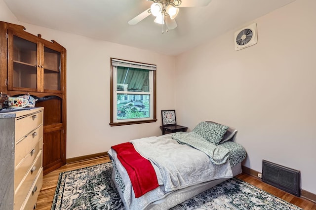 3427 Upton Ave N, Minneapolis, MN 55412 - bedroom with light wood-style floors, baseboards, and a ceiling fan