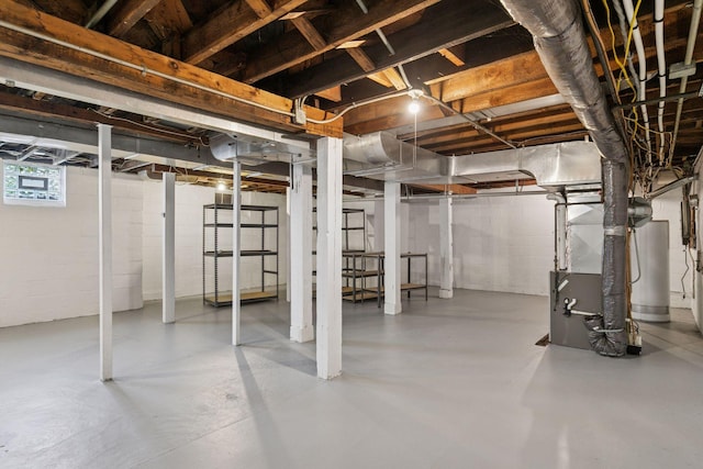 below grade area featuring heating unit