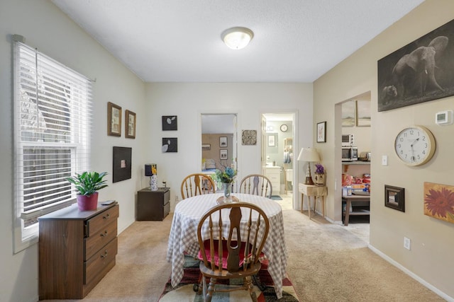 850 22nd Ave SE, Minneapolis, MN 55414 - dining space with light colored carpet