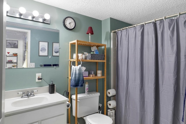 850 22nd Ave SE, Minneapolis, MN 55414 - bathroom with toilet, a shower with curtain, vanity, and a textured ceiling