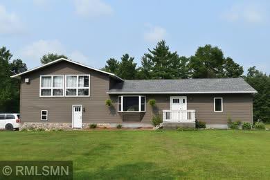 32255 County 21, Browerville, MN 56438 - back of house featuring a yard