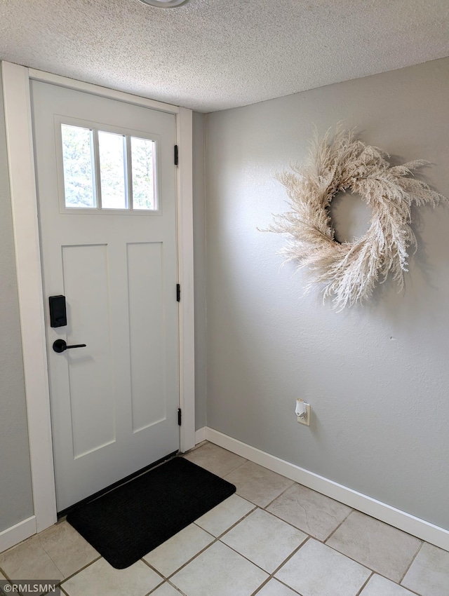 32255 County 21, Browerville, MN 56438 - entrance foyer with a textured ceiling, light tile patterned flooring, and baseboards