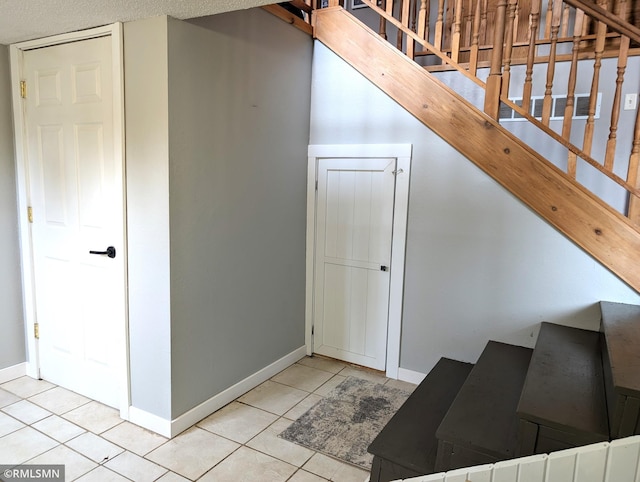 32255 County 21, Browerville, MN 56438 - staircase with tile patterned flooring and baseboards