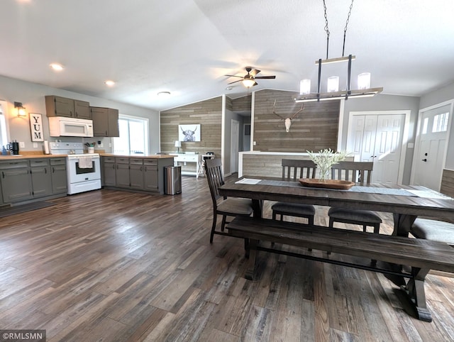 32255 County 21, Browerville, MN 56438 - dining area featuring vaulted ceiling, a ceiling fan, and dark wood finished floors