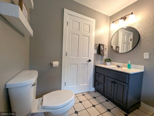 32255 County 21, Browerville, MN 56438 - bathroom with toilet, a textured ceiling, a textured wall, and vanity