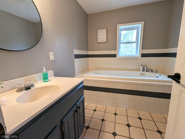 32255 County 21, Browerville, MN 56438 - full bath with vanity, a textured wall, a garden tub, and tile patterned floors