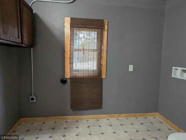 32255 County 21, Browerville, MN 56438 - laundry room featuring baseboards, cabinet space, tile patterned floors, hookup for an electric dryer, and hookup for a washing machine