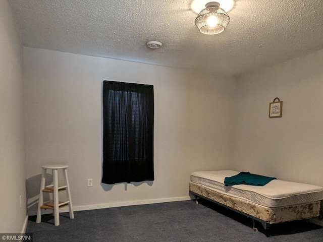 32255 County 21, Browerville, MN 56438 - carpeted bedroom with a textured ceiling and baseboards