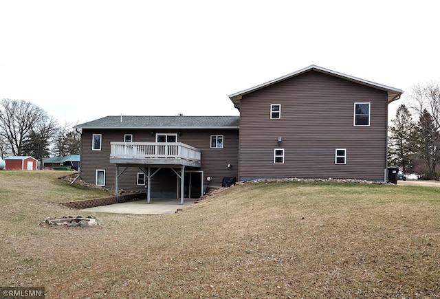 32255 County 21, Browerville, MN 56438 - back of property featuring a lawn, a patio, and a wooden deck