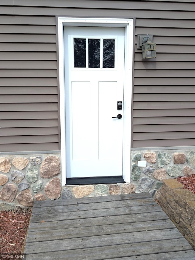 32255 County 21, Browerville, MN 56438 - view of exterior entry featuring stone siding