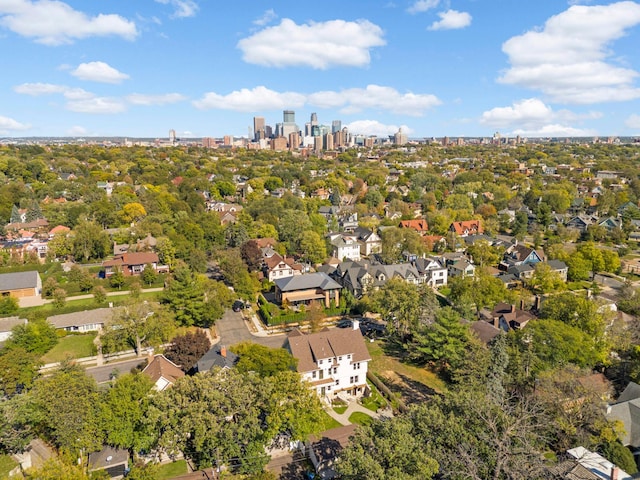 1647 26th St, Minneapolis, MN 55405 - aerial overview of property's location with nearby suburban area and a tree filled landscape
