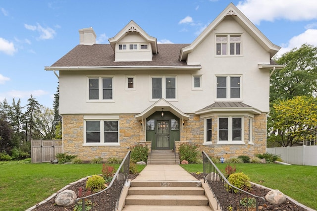 1647 26th St, Minneapolis, MN 55405 - view of front of house with stone siding, stucco siding, a chimney, and a shingled roof
