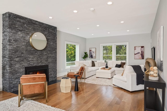 1647 26th St, Minneapolis, MN 55405 - living room with a fireplace, wood finished floors, and recessed lighting