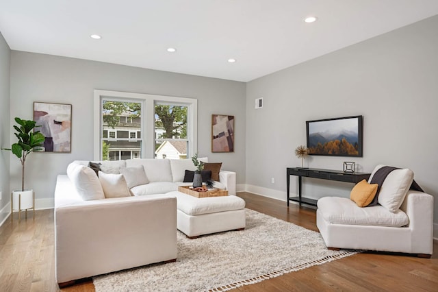 1647 26th St, Minneapolis, MN 55405 - living area featuring baseboards, recessed lighting, and wood finished floors