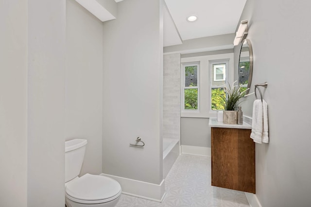 1647 26th St, Minneapolis, MN 55405 - full bathroom featuring baseboards, toilet, vanity, tile patterned flooring, and bathing tub / shower combination