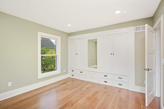 1647 26th St, Minneapolis, MN 55405 - mudroom featuring light wood-style floors, baseboards, and recessed lighting