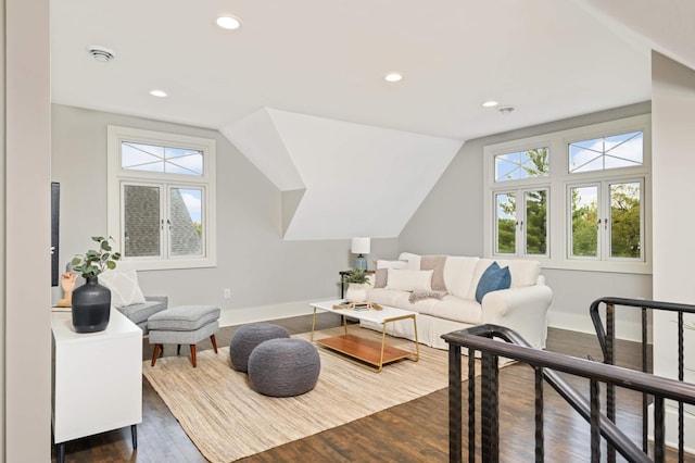 1647 26th St, Minneapolis, MN 55405 - living area with dark wood-type flooring, plenty of natural light, baseboards, recessed lighting, and lofted ceiling