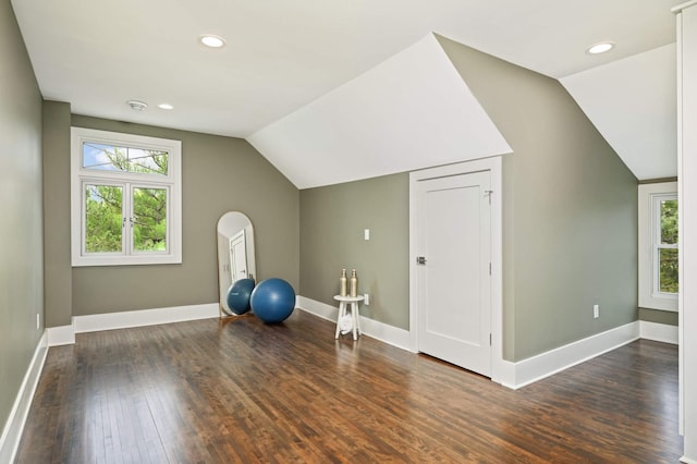 1647 26th St, Minneapolis, MN 55405 - bonus room with wood finished floors, lofted ceiling, healthy amount of natural light, baseboards, and recessed lighting