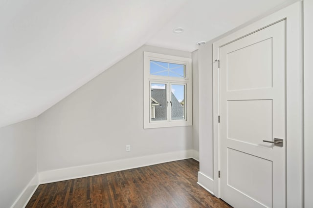 1647 26th St, Minneapolis, MN 55405 - additional living space featuring vaulted ceiling, baseboards, wood finished floors, and recessed lighting