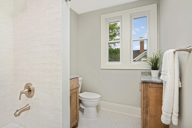 1647 26th St, Minneapolis, MN 55405 - bathroom featuring vanity and toilet