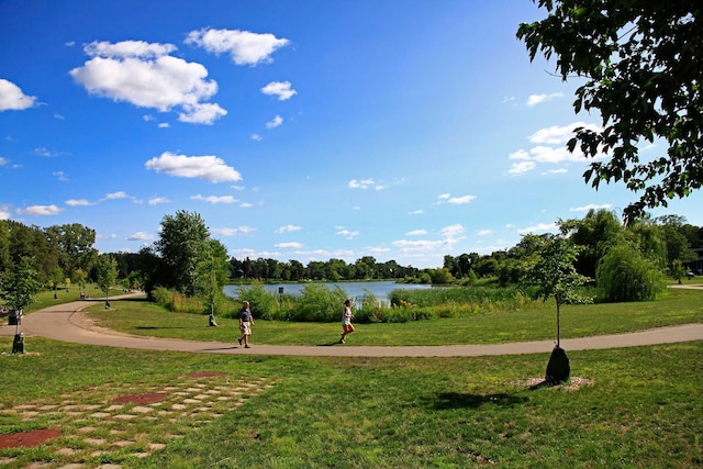 1647 26th St, Minneapolis, MN 55405 - view of community with a water view and a yard