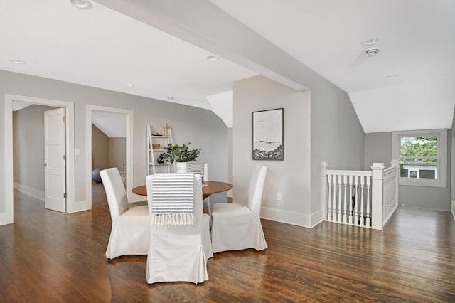 1647 26th St, Minneapolis, MN 55405 - dining room featuring wood finished floors, lofted ceiling, and baseboards