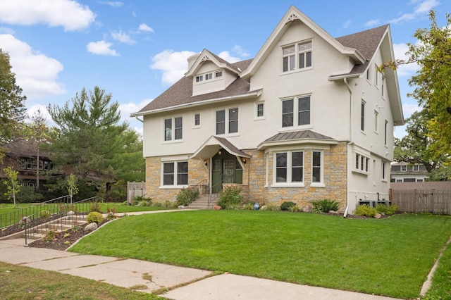 1647 26th St, Minneapolis, MN 55405 - view of front of property featuring stucco siding, stone siding, roof with shingles, and a standing seam roof