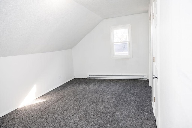 bonus room featuring carpet flooring, a textured ceiling, vaulted ceiling, baseboards, and baseboard heating
