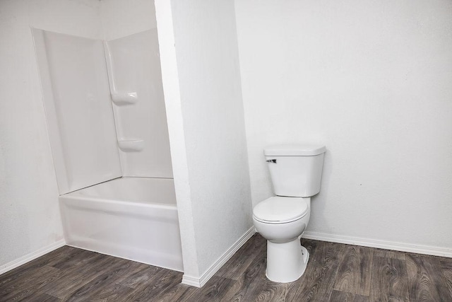 full bath with baseboards, toilet, and wood finished floors