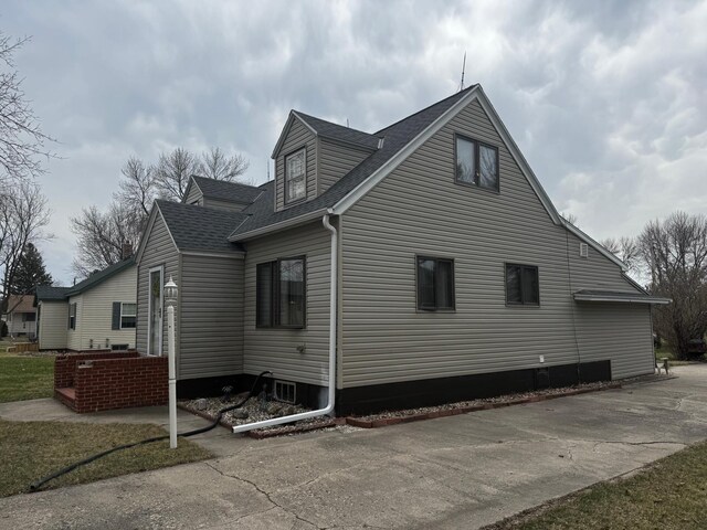 327 2nd St SW, Clara City, MN 56222 - view of home's exterior with roof with shingles