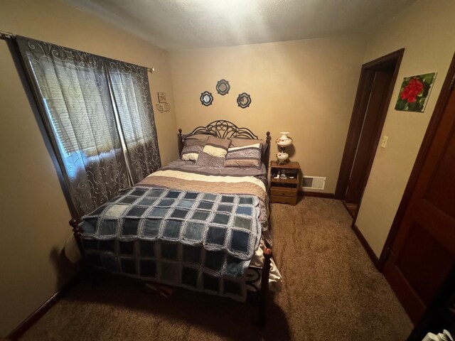 327 2nd St SW, Clara City, MN 56222 - carpeted bedroom with baseboards