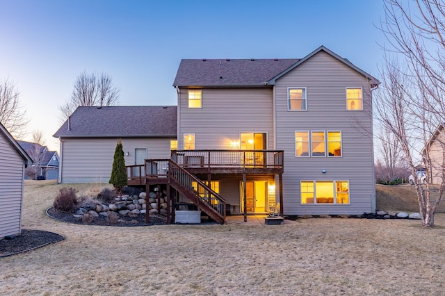 17639 Heidelberg Way, Lakeville, MN 55044 - back of property featuring a deck, stairway, and roof with shingles