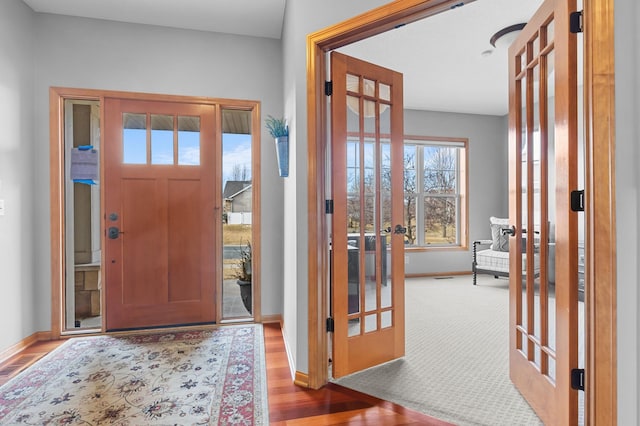 17639 Heidelberg Way, Lakeville, MN 55044 - foyer entrance featuring baseboards, french doors, and wood finished floors