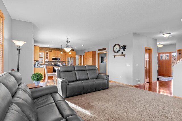 17639 Heidelberg Way, Lakeville, MN 55044 - carpeted living area featuring baseboards and recessed lighting