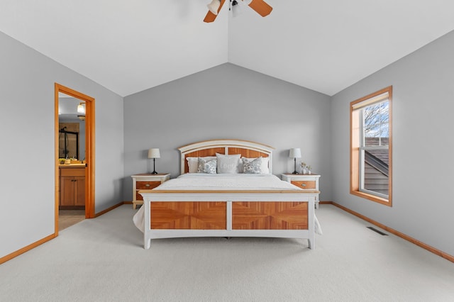 17639 Heidelberg Way, Lakeville, MN 55044 - bedroom with vaulted ceiling, light colored carpet, baseboards, ensuite bath, and ceiling fan