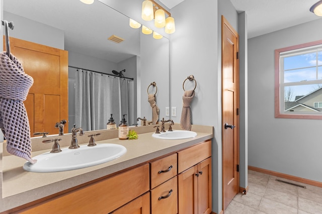 17639 Heidelberg Way, Lakeville, MN 55044 - bathroom with tile patterned flooring, double vanity, baseboards, and a shower with shower curtain
