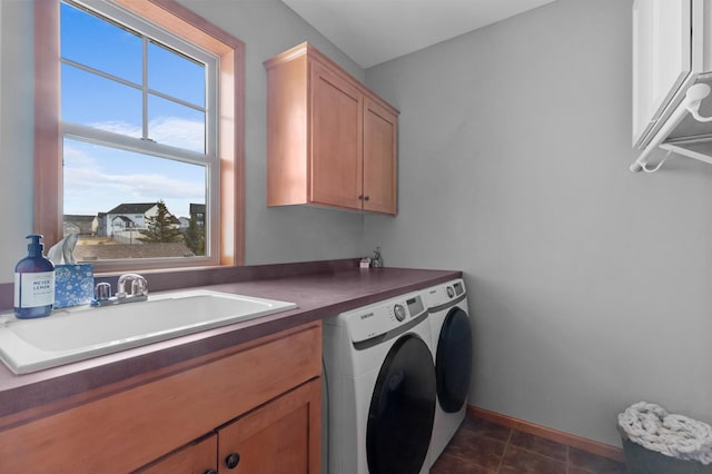 17639 Heidelberg Way, Lakeville, MN 55044 - laundry room with cabinet space, washing machine and clothes dryer, plenty of natural light, and baseboards
