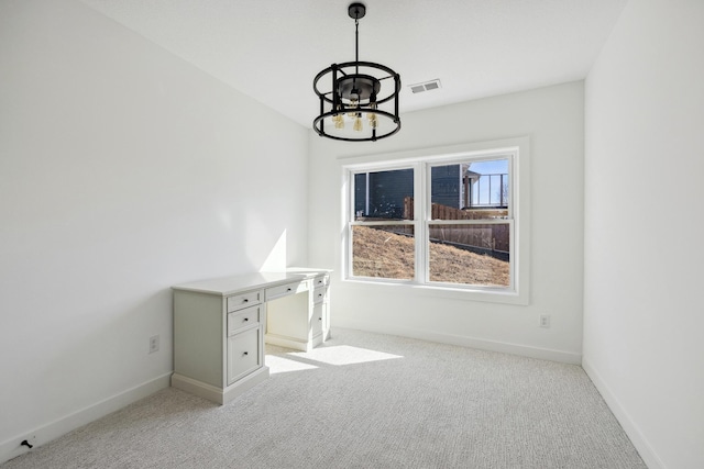 4240 Inland Ln N, Plymouth, MN 55446 - unfurnished dining area with light colored carpet, an inviting chandelier, visible vents, and baseboards