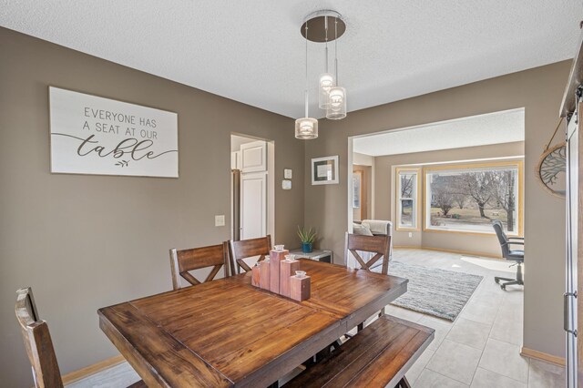 104 Birch Ave NW, Saint Michael, MN 55376 - dining area with a textured ceiling and light tile patterned flooring
