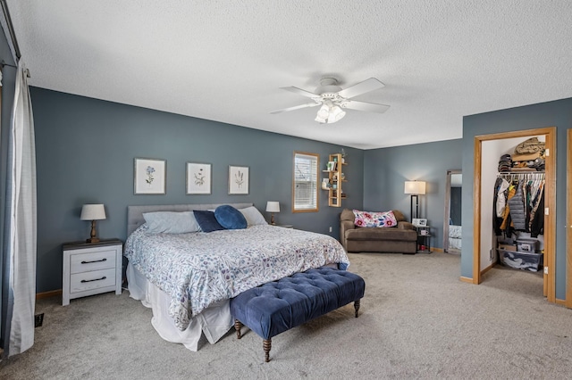 104 Birch Ave NW, Saint Michael, MN 55376 - bedroom with carpet flooring, a textured ceiling, a closet, a spacious closet, and ceiling fan