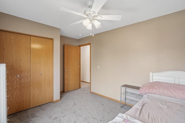 104 Birch Ave NW, Saint Michael, MN 55376 - bedroom featuring light carpet, baseboards, a closet, and ceiling fan