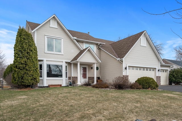104 Birch Ave NW, Saint Michael, MN 55376 - traditional-style home featuring a garage, roof with shingles, driveway, and a front yard