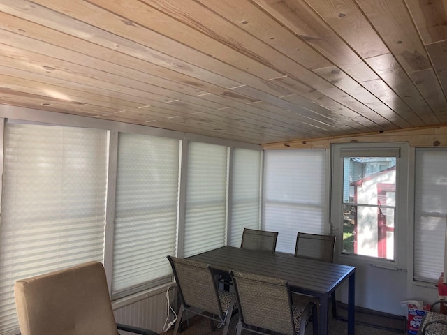 interior space with wooden ceiling and outdoor dining space